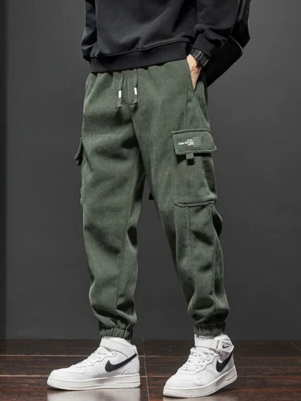 Pantalones casuales de cintura elástica de nuevo estilo para primavera y otoño para hombre, pantalones largos deportivos elásticos rectos con cordón ajustable para correr y harén para hombre